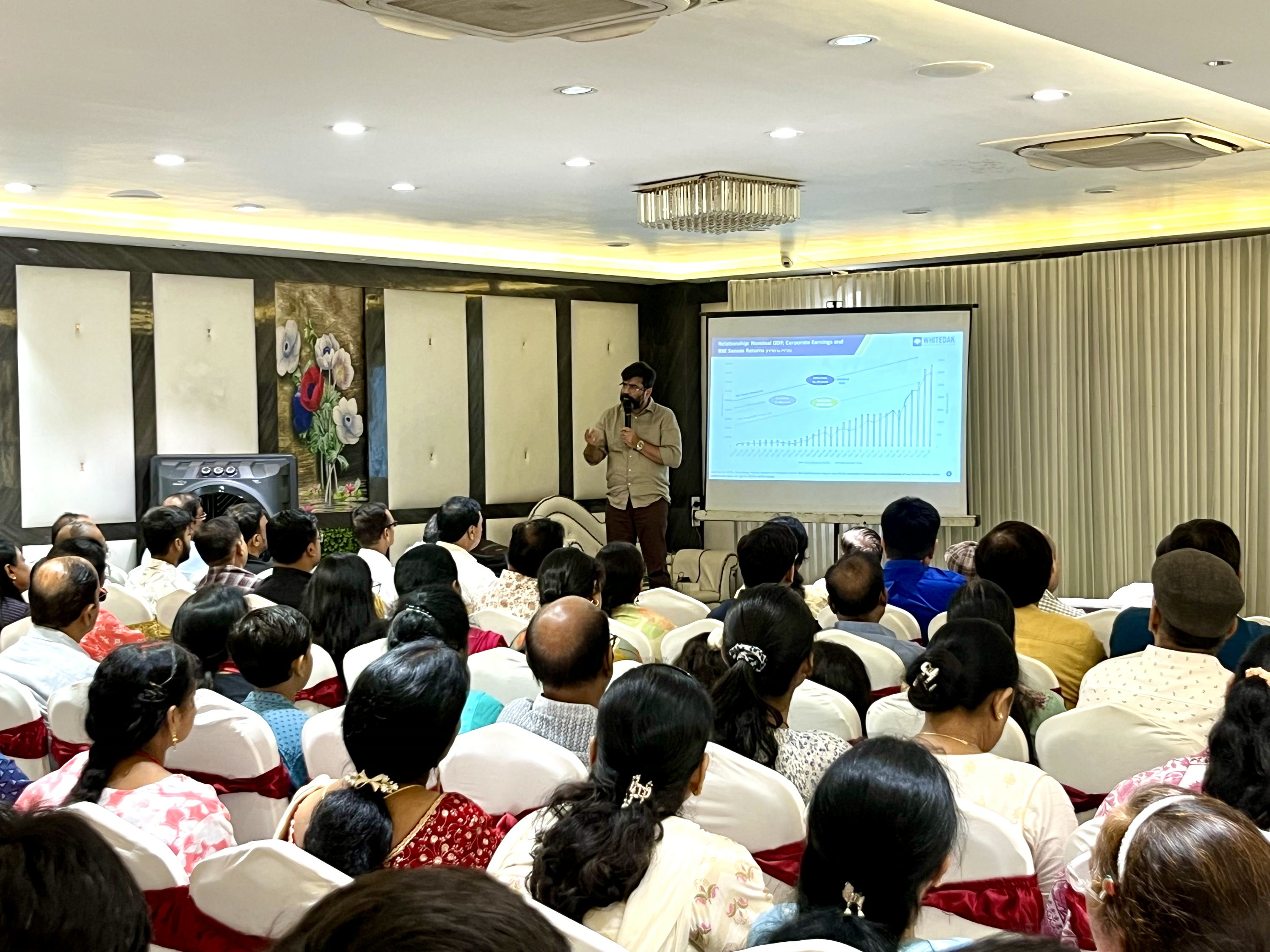 Aashish P. Somaiyaa speaking to the audience at the June 2025 Investor Education Programme in Jaunpur